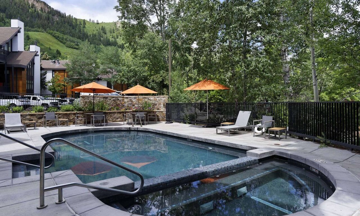 Aspen Condo | Aspen Mountain Hideaway - Stunning Views! Modern Decor, Wood FP, Outdoor Pool, HT & Walk to Town