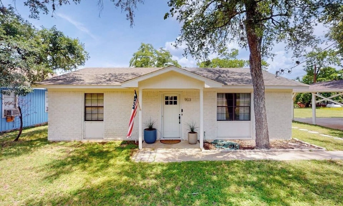 Granite Shoals House | Dog-friendly waterfront home with dock, grill, water views, patio, washer/dryer