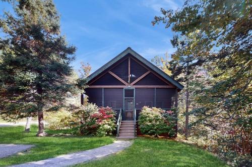 Northport House | Inviting dog-friendly cabin with wooded views, full kitchen & firepit