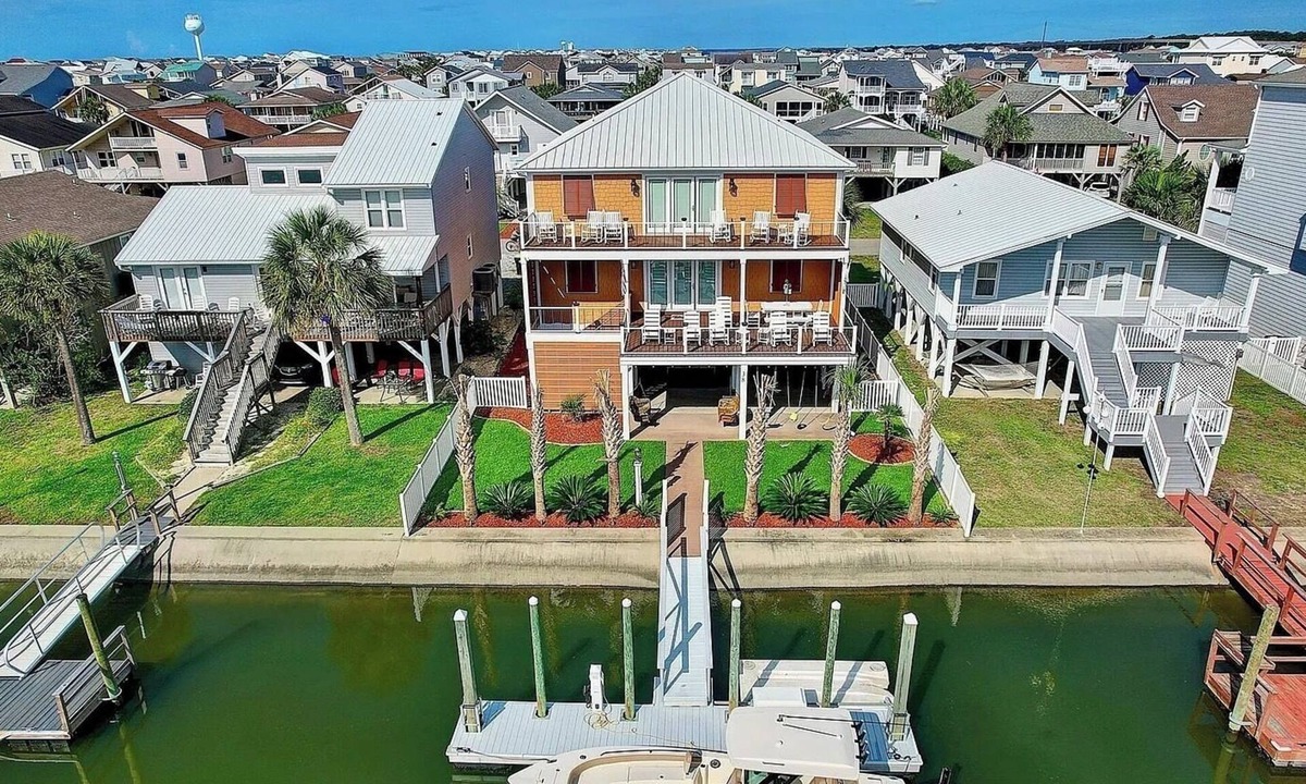 Ocean Isle Beach House | New Ocean Isle Rental. Canal Home 7BR/6BA - LOTS of outdoor living space.