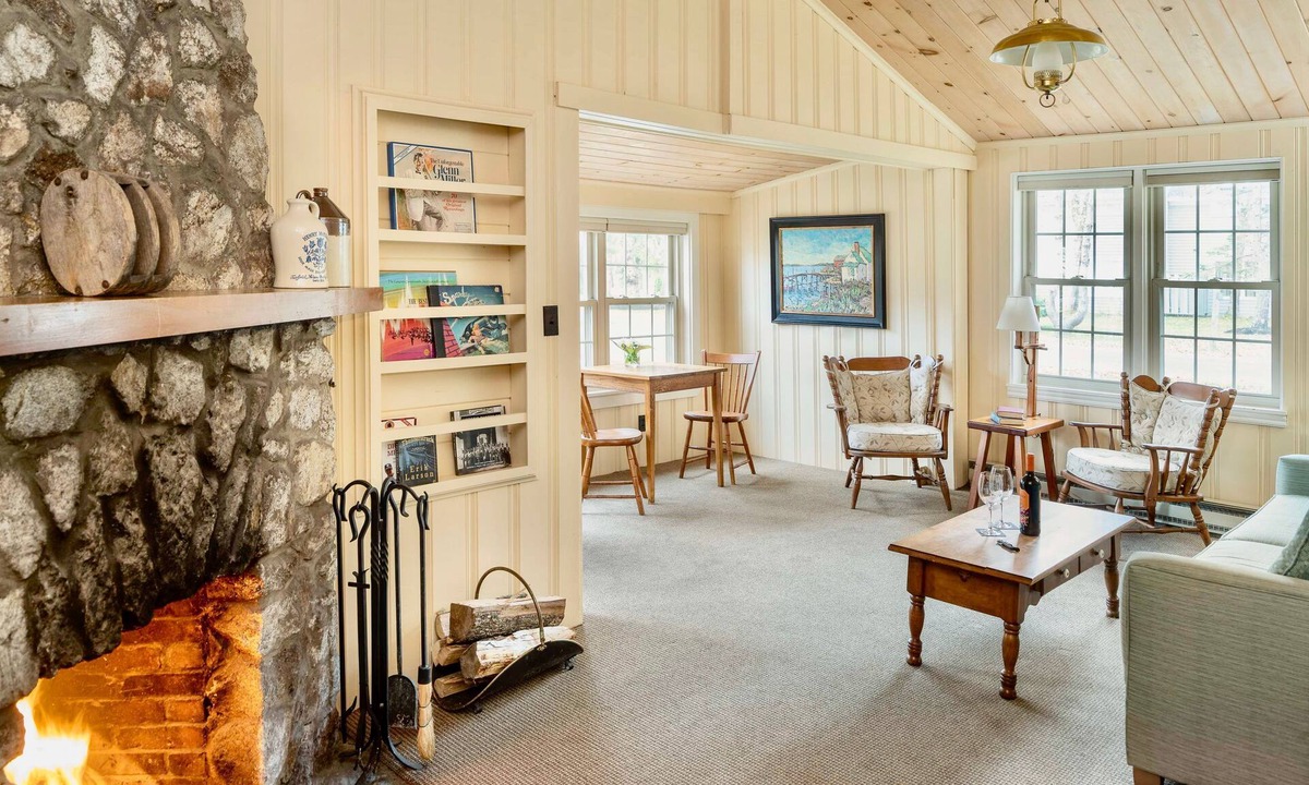 Boothbay Harbor Condo | Oriole Suite | Stone Fireplace + Woodland