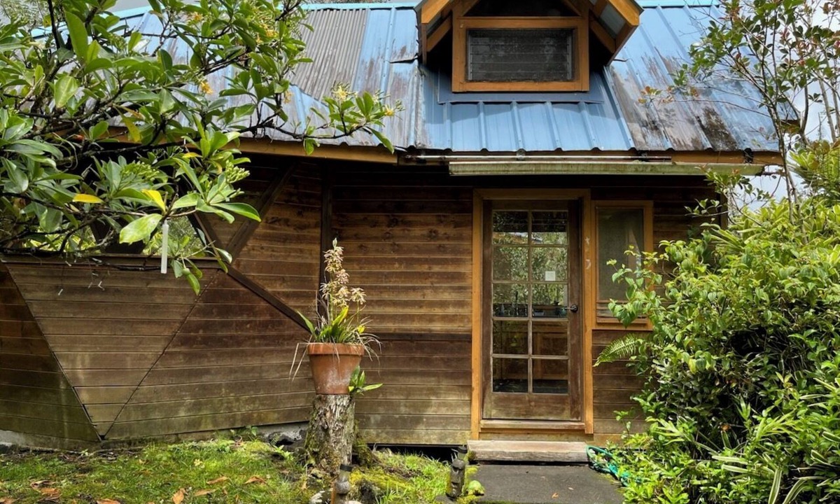 Orchidlands Estates Cottage | Solar powered bohemian loft cottage with birds, lizards, and frogs