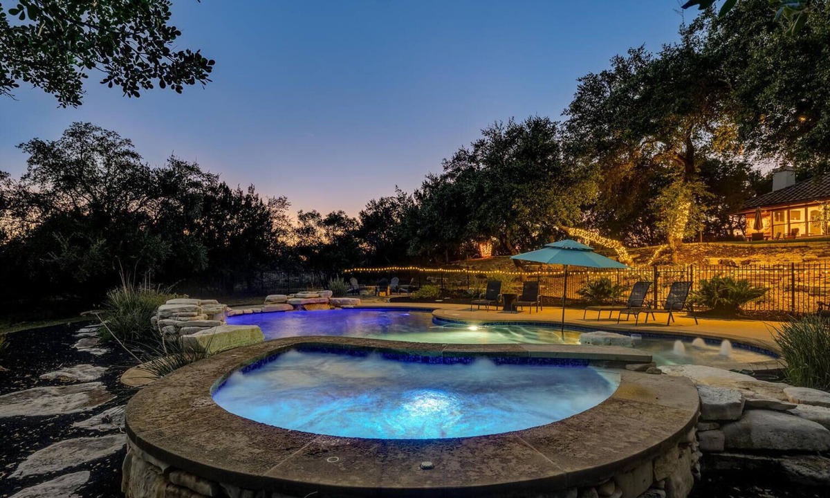 Coves On Lake Travis House | Spacious retreat, pool and hot tub within walking distance of Lake Travis.