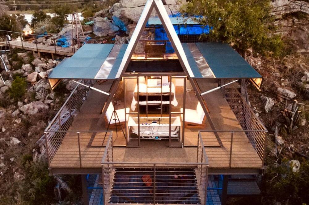 Cottonwood Shores Cabin | Stunning A-Frame with Folding Glass Walls & Open-Air Living in Cottonwood, Texas
