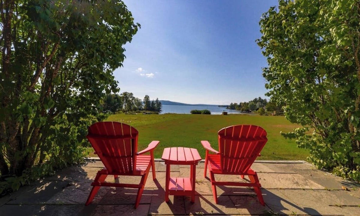 Greenville House | Two lakefront dog-friendly cabins on four acres with porches, dock, & lake views