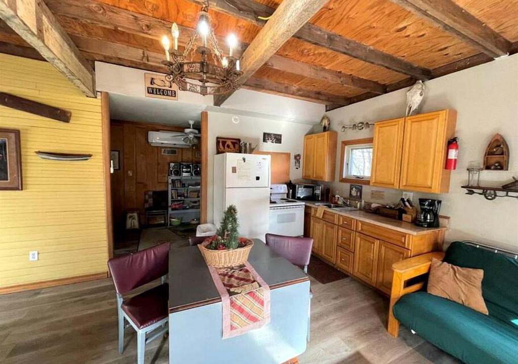 Marble Falls House | Two-Story Cabin Rental for Large Groups along Hamilton Creek in Marble Falls, Texas