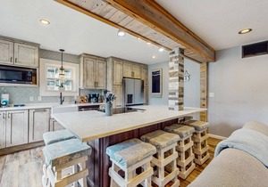 Dog-friendly condo w/mountain views, balcony, gas fireplace, & shared grills