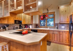 Large family townhome with pool, hot tubs, tennis court, balcony, & deck