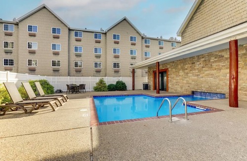 Johnston Hotel | 2 Suites | Spacious Suites w/Pool & Gym | 4.9 mi to Pole Position Raceway