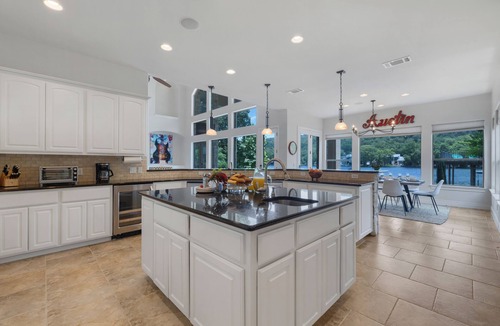 Oak Shores On Lake Austin House | 4BR Lake Austin Estate | Private Dock + Wake Surf Water | 200 Ft Frontage