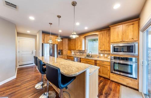 Point Pedernales House | 5BR 3BA Spicewood Prime Waterfront w Dock, Theater and Game Room by Austin Vacay