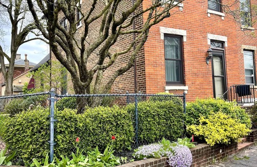 German Village House | Art filled German Village House. Double lot fenced in yard with 2 car garage