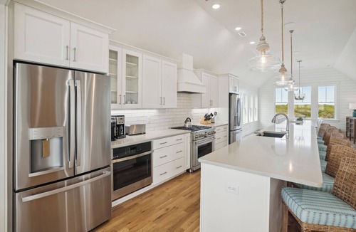 Pine Island House | Austin - New Construction Oceanfront 11BR with Elevator, Fire Pit, Pool, Fitness Room and More!