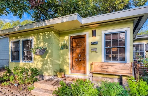 Dawson House | Authentic Mid-Century - Lush backyard and custom playscape! - by PMI Austin Metro