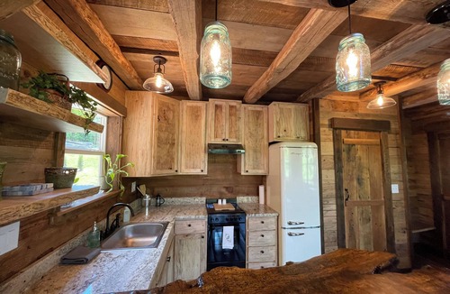 Nebo Cabin | Beautiful Log Cabin nestled on pond w/balcony for sunsets and stargazing.