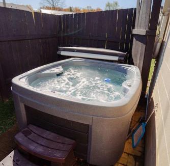 Logan House | Blue Heron Cottage with Game Room, Deck & Hot Tub