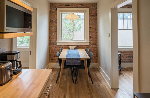 Historic Downtown Durango Hotel | Charming King One Bedroom Suite w/Kitchen + Living