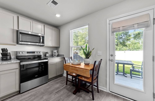 Ocean Isle Beach Cottage | Charming new home nestled between Sunset Beach and Ocean Isle Beach