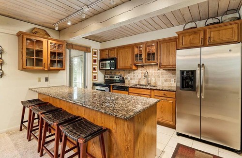 Aspen House | Chateau Eau Claire Unit 22, Condo Overlooking the Roaring Fork River with a Private Deck