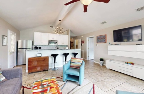 Saratoga Point House | Chic home on Lake Austin with dock, lovely deck, vibrant interior & views