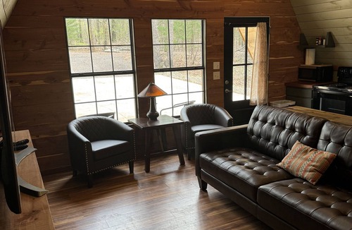 Lindale Cabin | Coyote Creek A-Frame Cabin with Firepit, Nature Trail, Games, Outside Activities