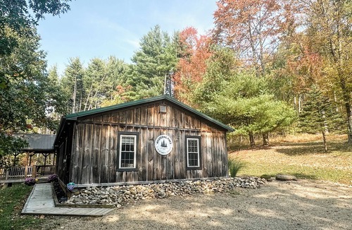 Butler Cabin | Cozy 2BR/2BA cabin tucked in the trees with hot tub, fire pit, covered deck, and fast WiFi.