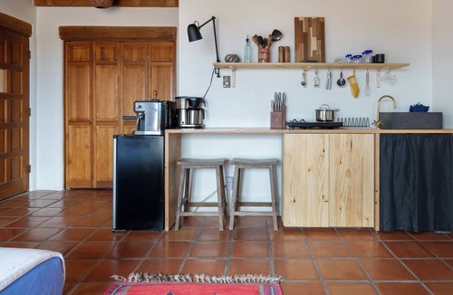 Arroyo Seco Apartment | Cozy adobe studio with private balcony, mountain views, and classic Southwest charm—just minutes from Taos, Arroyo Seco, and Taos Ski Valley. Perfect for a peaceful canyon escape with modern comforts.