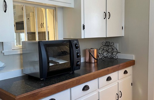 Asheville House | Cozy, long term welcome, pet & family friendly, fenced yard, fire pit, deck.
