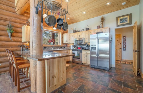 Angel Fire Ski Chalet | Custom high-end 3 bedroom log cabin sleeps 12. Located on the ski hill!