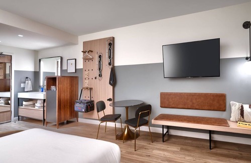 Moab Hotel | Deluxe Two Queens + Sofa Bed at Gravity Haus Moab, Pool, Pets Are Allowed