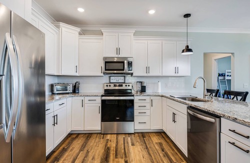 Tranquil Harbour House | Dog-Friendly 4BR Retreat with a Fire Pit Located in the Serene Part of Oak Island –Near Boat Launch
