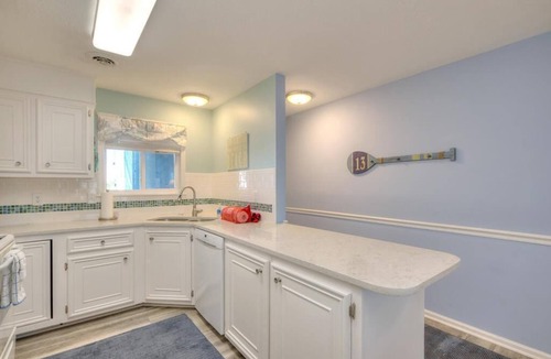 Long Beach Condo | Enjoy ocean views at WBV 103 A Stones Throw, a cozy 2BR condo in Oak Island.