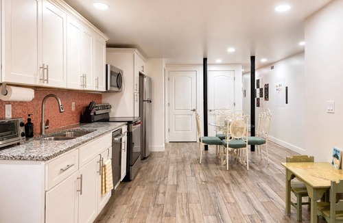 Stone Mountain House | EV Charger - 2 King Suites - Game Room - Office Space - Basement Apartment