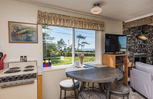 Sequim House | Fireplace Room - Water view, Jetted tub, King, Kitchen