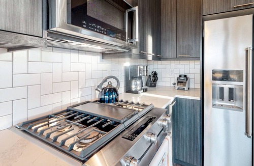 Rendezvous House | Gorgeous, modern house with patio, fireplace, private hot tub, & mountain views