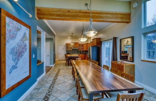 Kodiak House | Grandeur Gathering Luxurious retreat with hot tub