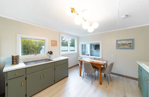 Homer House | Historic Bungalow on Centrally Located Half-Acre Private Lot