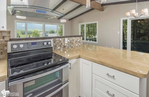 Northeast Anchorage House | Hot Tub Mountain views Cozy Fireplace!