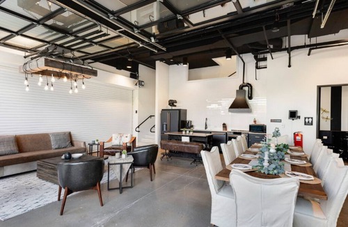East Cesar Chavez House | Inn Cahoots on 6th: 5BR/13BedsPool, Rooftop, Garden Bars, Walk to Everything!