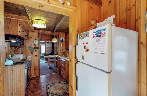 Greenville House | Lakefront cabin with private boat ramp, lake access, wrap-around porch, firepit