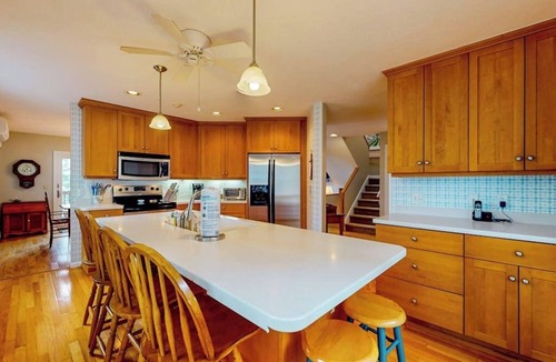 Bridgton Condo | Lakefront condo with on-site pool, dock, swimming, firepit, & tennis