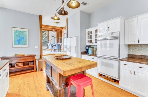 Burnet House | Lakeside Leisure - Peaceful waterfront home with a boat dock and game room.