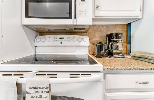 Point Venture House | Lovely condo with Olympic-size pool, central AC, balcony, & washer/dryer
