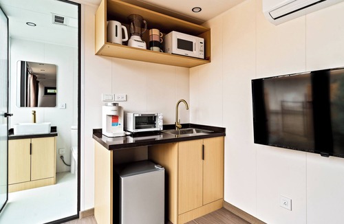 Taos Cabin | LUXX Space Cabin Tiny House with rooftop deck, private fenced patio.
