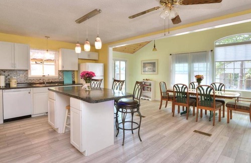 Tranquil Harbour House | Mandolin Wind your family beach getaway. 5 minute walk to the beach.