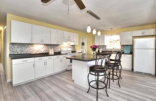 Tranquil Harbour House | Mandolin Wind your family beach getaway. 5 minute walk to the beach.