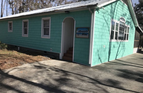 Tranquil Harbour House | Mandolin Wind your family beach getaway. 5 minute walk to the beach.