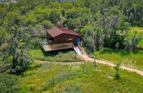Dripping Springs Cabin | Modern Cabin w Heated Pool, Firepit, Trails, Stars