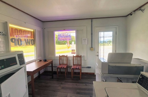Isabella Apartment | Motel Room 1A with Bar & Grill and Laundromat