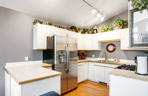 Willow Grove House | Mountain view home with private hot tub, fireplace, charming interior & deck